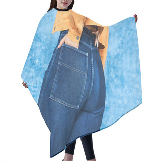 Personality  Cropped View Of Anonymous Plus Size Woman In Orange Jacket And Posing With Hand In Pocket Of Denim Jeans While Standing On Mottled Blue Background, Body Positive  Hair Cutting Cape