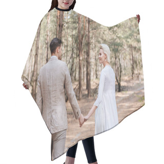 Personality  Just Married Couple Holding Hands And Looking At Each Other In Forest Hair Cutting Cape