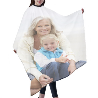 Personality  Grandmother And Granddaughter On Holiday Sitting On Winter Beach Hair Cutting Cape