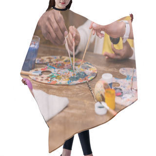 Personality  Cropped Image Of African American Parents And Daughter Putting Paint Brushes On Palette, Easter Concept Hair Cutting Cape