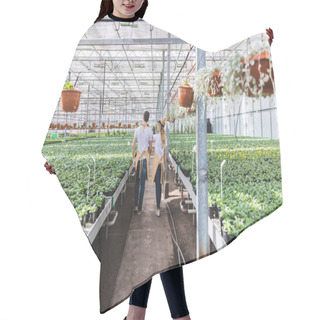 Personality  Couple Of Gardeners Walking Among Plants In Glasshouse Hair Cutting Cape