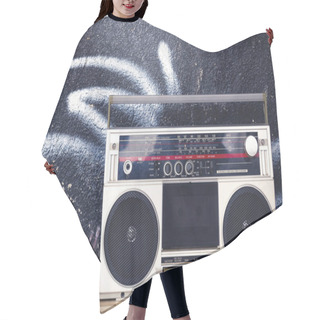 Personality  Vintage Boom Box With Cassettes On The Floor And On A Graffiti Background. Memory Of The Music Of The Past. Hair Cutting Cape