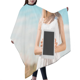 Personality  Partial View Of Young Woman In White Dress Showing Digital Tablet With Blank Screen  Hair Cutting Cape