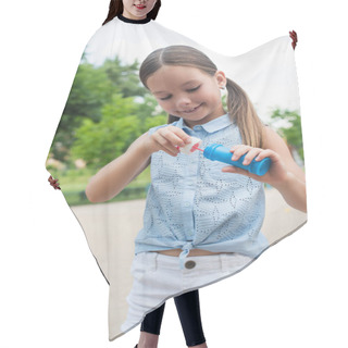 Personality  Cheerful Girl Holding Bottle And Bubble Blower Outdoors Hair Cutting Cape