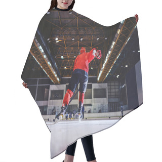 Personality  Rear View Of Hockey Player Skating Towards Opposite Team And Trying To Score. Hall Interior. Hair Cutting Cape