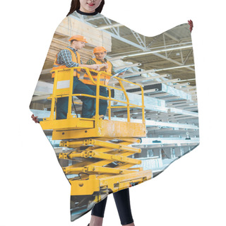 Personality  Multicultural Warehouse Workers With Digital Tablet And Clipboard Standing On Scissor Lift  Hair Cutting Cape