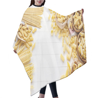 Personality  Assorted Raw Pasta: Pens, Shells, Rigatoni, Fusilli, Linguine, And Squid, Top View, Copy Space.  Hair Cutting Cape