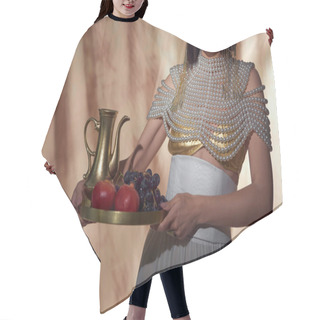 Personality  Cropped View Of Woman In Egyptian Look Holding Jug And Fruits While Posing On Abstract Background Hair Cutting Cape