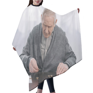 Personality  Senior Man Sitting At Table And Counting Money At Home Hair Cutting Cape