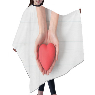 Personality  Heart In Hands Top View. Hair Cutting Cape