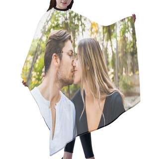 Personality  Man And Woman In Love In A Park Having A Romantic Kiss. Hair Cutting Cape
