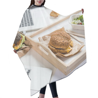 Personality  Close Up Of Tasty Burgers With Fresh Salad And Bread Loaf With Laptops On Tabletop Hair Cutting Cape