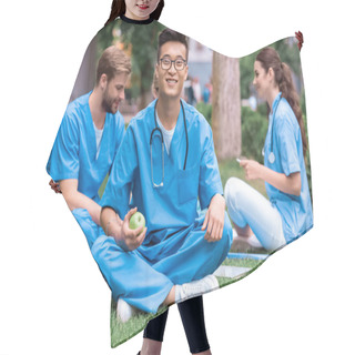 Personality  Handsome Asian Medical Student Holding Apple And Looking At Camera Hair Cutting Cape