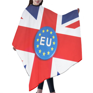 Personality  London, UK - November 20th 2018: An EU Pin Badge, Pictured Over The Flag Of The United Kingdom. Hair Cutting Cape