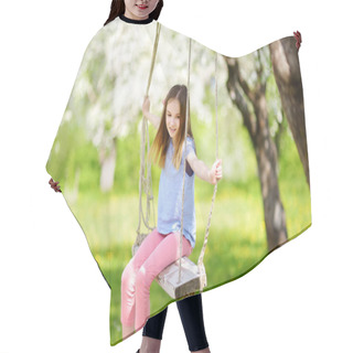 Personality  Cute Little Girl Having Fun On A Swing In Blossoming Old Apple Tree Garden Outdoors On Sunny Spring Day. Spring Outdoor Activities For Kids. Hair Cutting Cape