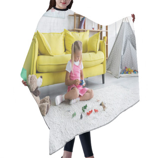 Personality  Preschooler Girl Sitting On Carpet And Playing With Toy In Modern Playroom  Hair Cutting Cape