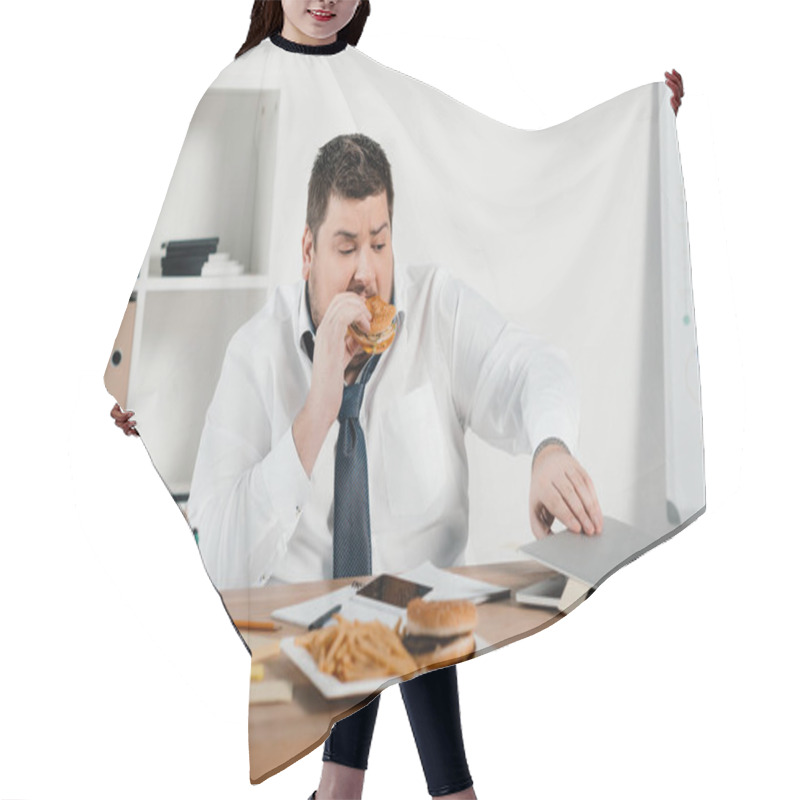 Personality  Overweight Businessman Eating Hamburger And Using Laptop In Office Hair Cutting Cape