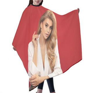 Personality  Beautiful Elegant Blonde Lady Posing On Red Studio Background. Hair Cutting Cape