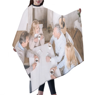 Personality  Overhead View Of Friends Sitting With Tea At Table At Room Interior  Hair Cutting Cape