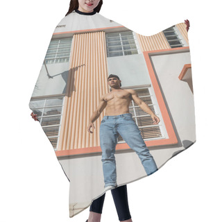 Personality  Muscular Cuban Man In Baseball Cap And Jeans Standing On Parapet Near Building With American Flag  Hair Cutting Cape