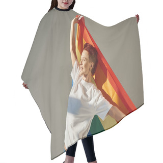 Personality  Happy And Unique Queer Person In White T-shirt Posing With Rainbow Colors LGBT Flag On Grey Backdrop Hair Cutting Cape