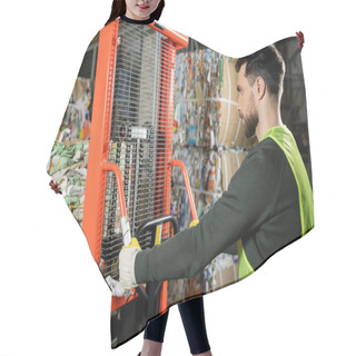 Personality  Side View Of Bearded Worker In Protective Vest And Glove Using Hand Pallet Truck With Waste Paper While Working In Blurred Garbage Sorting Center, Recycling Concept Hair Cutting Cape