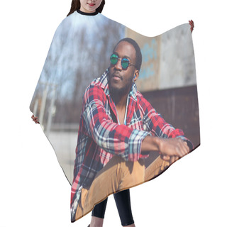 Personality  Outdoor Fashion Portrait Of Stylish Young African Man Listens To Hair Cutting Cape