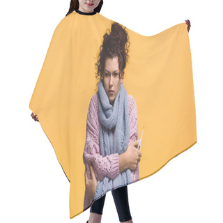 Personality  Upset And Diseased Woman In Knitted Sweater Holding Thermometer Isolated On Orange Hair Cutting Cape