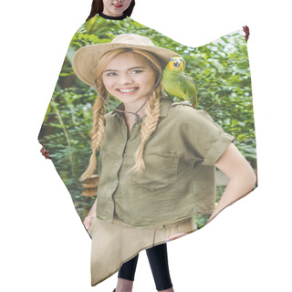 Personality  Smiling Young Woman In Safari Suit With Parrot On Shoulder In Jungle Park Hair Cutting Cape