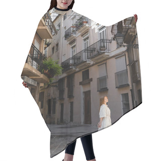 Personality  Redhead Woman In Dress Standing Near Houses On European Street In Valencia  Hair Cutting Cape