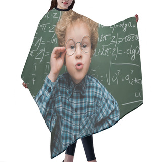Personality  Smart Kid Touching Glasses And Standing With Hand On Hip Near Chalkboard  Hair Cutting Cape