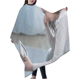 Personality  Selective Focus Of Upset Woman Looking At Picture Frame, Crying And Wiping Tears At Home Hair Cutting Cape
