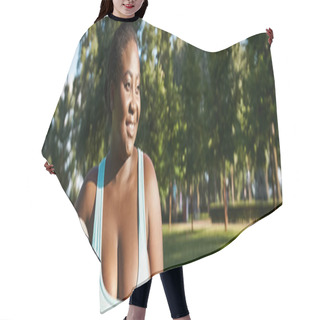 Personality  An African American Woman, Body Positive And Curvy, Holding A Yoga Mat In A Serene Park Setting. Hair Cutting Cape