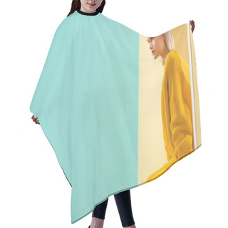 Personality  Side View Of Stylish Woman In Yellow Sweater And Tights Sitting On Decorative Window Hair Cutting Cape
