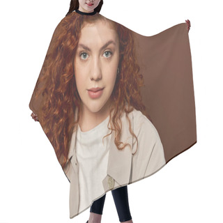 Personality  Portrait Of Redhead Woman With Curly Hair Looking At Camera On Brown Background, Autumn Colors Hair Cutting Cape