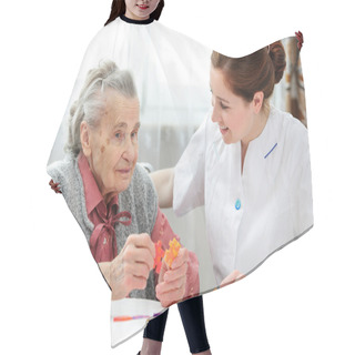 Personality  Senior Woman With Her Caregiver Hair Cutting Cape