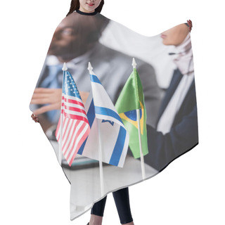 Personality  Selective Focus Of Usa, Israeli And Brazilian Flags Near Arabian And African American Business Partners On Blurred Background Hair Cutting Cape