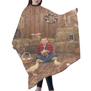 Personality  Easter Composition. Small Boy Plays And Communicates With Group Of Ducklings Mulard Breed, Sitting On Wooden Floor In Hayloft. Eggs In Basket. Child Holds Fluffy Duckling In His Hands. Copy Space. Hair Cutting Cape