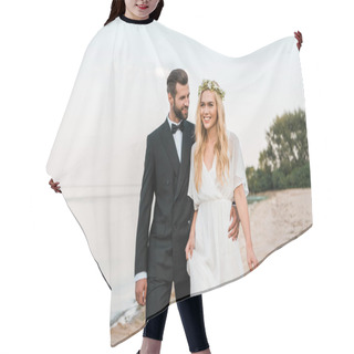 Personality  Groom Hugging Bride And Walking On Beach, Bride Holding High Heels In Hand Hair Cutting Cape