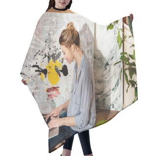 Personality  Side View Of Smiling Young Female Painter Using Laptop In Art Studio Hair Cutting Cape