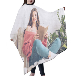 Personality  Attractive Cheerful Girl Smiling At Camera While Sitting With Book On Soft Chaise Lounge Hair Cutting Cape