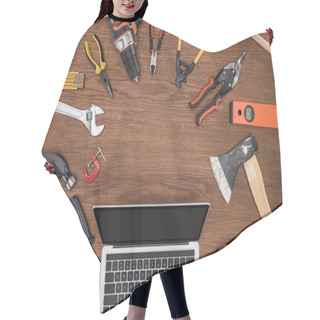Personality  Top View Of Laptop With Blank Screen Surrounded By Arranged Various Tools On Wooden Table  Hair Cutting Cape