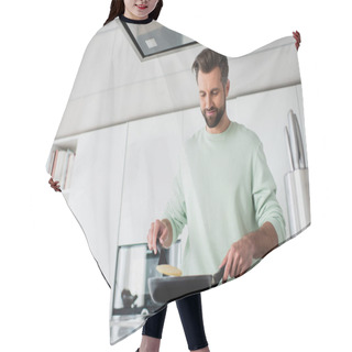 Personality  Pleased Man Preparing Pancakes For Breakfast In Kitchen Hair Cutting Cape