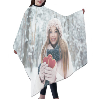 Personality  Portrait Of Beautiful Young Woman With Hearts In Hands Looking At Camera In Snowy Park Hair Cutting Cape