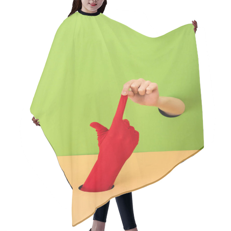 Personality  Cropped View Of Woman Taking Off Red Glove On Orange And Green Hair Cutting Cape