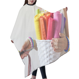 Personality  A Woman Holds Bright Colored Fabrics For Sewing And Scissors. Hair Cutting Cape