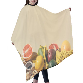 Personality  Sunglasses, Earrings, Digital Tablet And Ripe Fruits In String Bag On Brown   Hair Cutting Cape