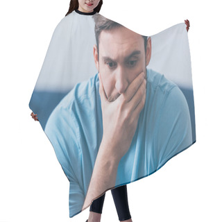 Personality  Selective Focus Of Stressed Man Covering Mouth With Hand At Home Hair Cutting Cape
