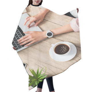 Personality  Top View Of Freelancer Using Laptop Near Cup Of Coffee, Plant And Smartphone With Blank Screen  Hair Cutting Cape