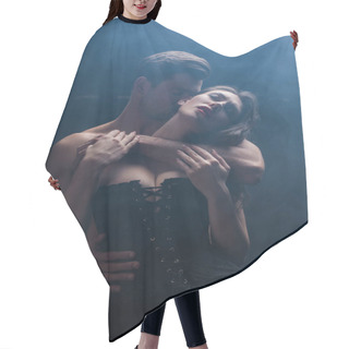 Personality  Handsome Man Kissing And Hugging Seductive Woman In Corset On Black Background With Smoke Hair Cutting Cape